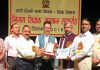 Union Minister Dr Jitendra Singh, as chief guest, flanked by MoS Home Kiren Rijiju, presenting awards to distinguished teachers at a function organized by Delhi Municipal Corporation, at New Delhi on Wednesday.
