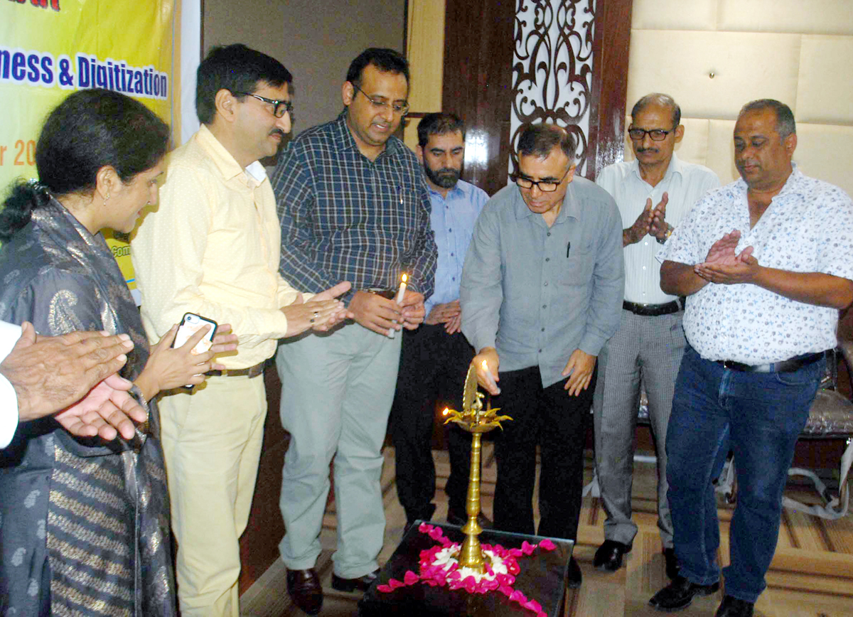 Dignitaries lighting the ceremonial lamp to inaugurate a seminar at Jammu on Friday. -Excelsior/Rakesh Dignitaries lighting the ceremonial lamp to inaugurate a seminar at Jammu on Friday. -Excelsior/Rakesh