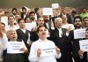Lawyers protesting in District Court Complex at Janipur on Friday. -Excelsior/ Rakesh