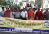 Traders led by CAIT vice president, Neeraj Anand staging protest near DC office in Jammu on Friday. -Excelsior/ Rakesh