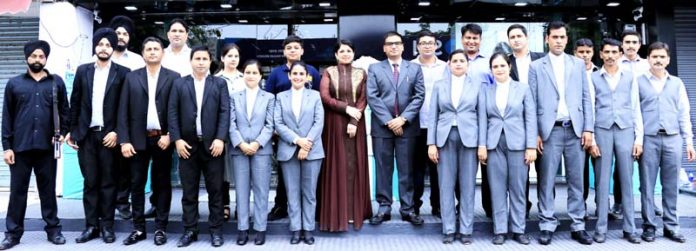 The officials of Fortofino posing for photograph during launching ceremony at Jammu on Sunday.