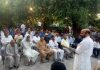 Former Minister and MLA, Bali Bhagat addressing public meeting in Raipur-Domana constituency on Thursday.