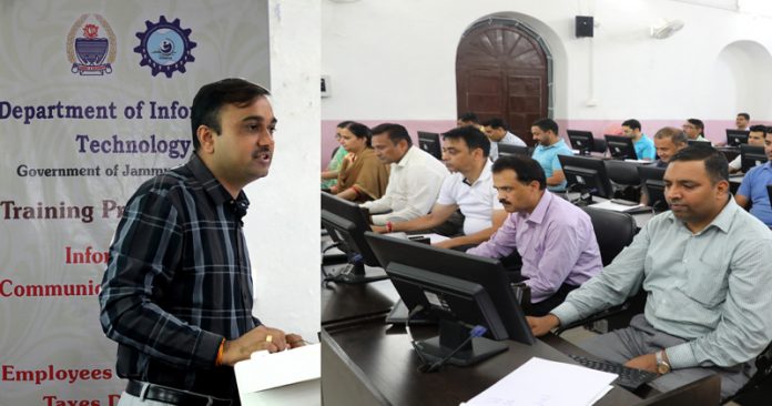 DC Jammu delivering lecture to employees of Commercial Taxes during a training programme.