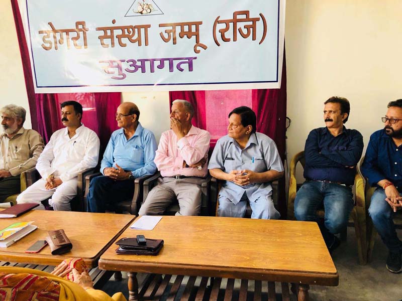 Dogri writers during a short story reading session at Jammu on Saturday. Dogri writers during a short story reading session at Jammu on Saturday.