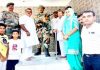 Former Minister and MLA Chander Prakash Ganga paying homage to Shaheed Ravi Paul at Sarwa, Ramgarh in Samba.
