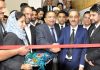 Justice Ali Mohammad Magrey Member NLSA inaugurating a National Lok Adalat at Srinagar on Saturday.