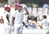 Jason Holder shares a laugh with Roston Chase during 2nd Test match against India at Hyderabad on Friday.