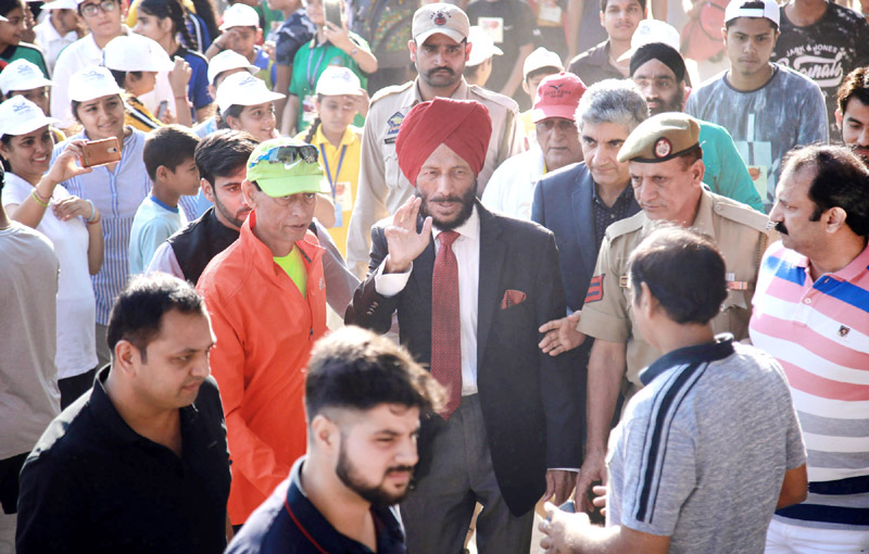 Legendary sprinter Milkha Singh being followed by his fans in Jammu on Sunday. -Excelsior/ Rakesh Legendary sprinter Milkha Singh being followed by his fans in Jammu on Sunday. -Excelsior/ Rakesh