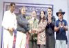 Former DyCM and MLA Kavinder Gupta presenting award of Young Women Entrepreneur to Shivya Agarwal.