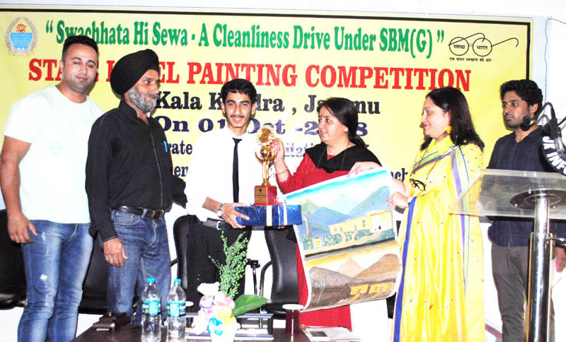 Winners of painting competition under SHS being honoured in Jammu. Winners of painting competition under SHS being honoured in Jammu.
