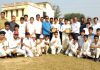 Players of winner and runner-up teams posing for photograph along with dignitaries at Sports Stadium, Hiranagar in District Kathua.