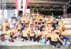 Medal winners of ‘Glow Run’ posing for a group photograph in Jammu.