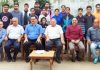State Badminton teams posing along with dignitaries before leaving for North Zone Badminton Championship.