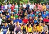 Participants posing along with dignitaries and officials in Jammu on Friday.
