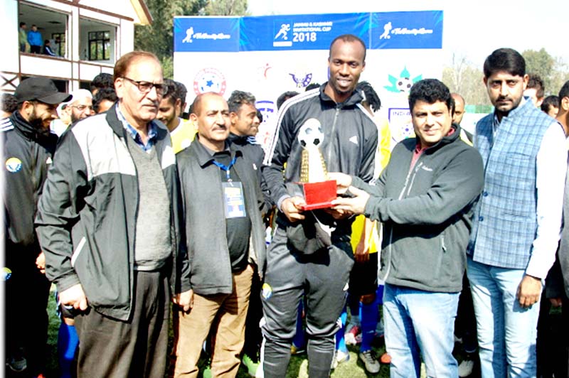 Secretary YS & Sports Sarmad Hafeez presenting trophy to winner in Srinagar. Secretary YS & Sports Sarmad Hafeez presenting trophy to winner in Srinagar.