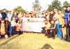 Athletes posing along with officials after participating in Promo Run for Jammu Half Marathon.