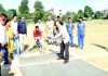 VC JU Prof Manoj Dhar testing his cricketing skills while inaugurating North Zone T20 Cricket tournament for Deaf in Jammu.
