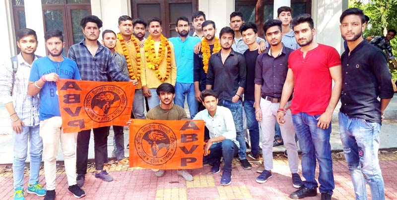 Newly elected members of ABVP's MAM College Unit posing for group photograph. Newly elected members of ABVP's MAM College Unit posing for group photograph.