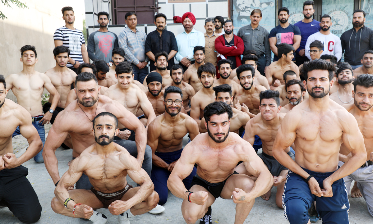 Bodybuilders displaying muscles during weighing of Mr Jammu Bodybuilding C’ship in Jammu. Bodybuilders displaying muscles during weighing of Mr Jammu Bodybuilding C’ship in Jammu.