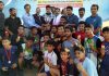 Winners of Handball Championship under Khelo India posing along with dignitaries and officials at Subash Stadium in Udhampur.