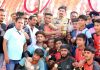 Winners of Kabaddi Tournament posing for a group photograph along with chief guest and other dignitaries at Udhampur.