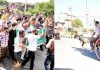 Transporters and operators taking out strong protest march in Jammu on Monday (L) and people travelling on horsecart in Kathua (R).-Excelsior/Rakesh/Pardeep
