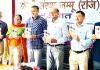 Former Minister, Sham Lal Sharma, along with prominent literary personalities releasing a story book in Dogri.