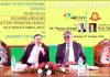 J&K Bank Chairman Parvez Ahmed, VC KU Professor Talat Ahmad and others during bank's go green initiative at KU on Monday.