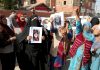 Family of torture victim protesting in Srinagar on Friday. -Excelsior/Shakeel