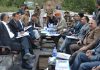 DC Baramulla Dr Nasir Ahmad Naqash and other trade authorities at a meeting at Kaman Post on Tuesday. —Excelsior/Aabid Nabi