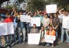PM Employment Package candidates protesting outside Governor House in Jammu on Monday. -Excelsior/Rakesh