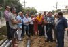 Former Deputy CM, Kavinder Gupta starting laying of pipes at Channi on Tuesday.