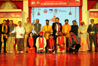 Preliminary round winners of All India Devotional Song Competition and dignitaries posing for group photograph. Preliminary round winners of All India Devotional Song Competition and dignitaries posing for group photograph.