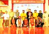 Preliminary round winners of All India Devotional Song Competition and dignitaries posing for group photograph.