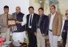 CTA delegation members posing with Governor SP Malik after a meeting at Raj Bhawan in Srinagar.