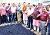 Former Deputy CM & MLA Kavinder Gupta and MLC Vikram Randhawa kick starting macadamization of road in Patel Nagar area of Gandhi Nagar Constituency on Friday.