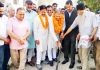 Former Deputy CM & MLA Gandhi Nagar, Kavinder Gupta kick-starting blacktopping of road in Ekta Vihar, Gangyal on Friday.