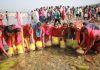 Devotees immersing ‘Saakh’ in river Tawi at Jammu on Thursday. -Excelsior/Rakesh