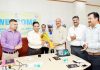 Representatives of oil industry presenting a bouquet to Director, FCS&CA, Dr Abdul Rashid before a meeting at BPCL office, Bahu Plaza, Jammu.