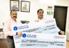 Union Minister Dr Jitendra Singh receiving two cheques worth Rs.2.58 crore as funds contributed by the Haryana Commerce & Industries Minister, Vipul Goel, on Saturday.