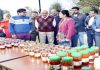 Chief Secretary inspecting products put on display at an exhibition on Wednesday.