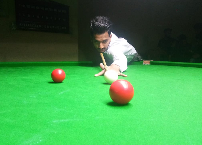 Cueist Arjun Singh aiming at target during his final match against Aman Choudhary at Billiards Hall, MA Stadium Jammu on Monday. Cueist Arjun Singh aiming at target during his final match against Aman Choudhary at Billiards Hall, MA Stadium Jammu on Monday.