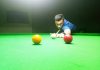 Cueist Aman Choudhary in action during match at Billiards Hall, MA Stadium Jammu on Tuesday. — Excelsior/Rakesh