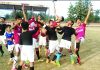 Players of Football Club Hiranagar in jubilant mood after winning final match.