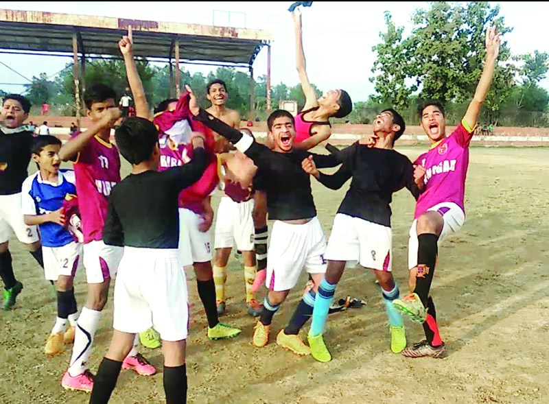 Players of Football Club Hiranagar in jubilant mood after winning final match. Players of Football Club Hiranagar in jubilant mood after winning final match.