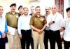 Police Badminton players posing for photograph with DGP Dilbag Singh and others.
