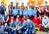 Winners of Inter-School Patriotic Singing Competition and dignitaries posing for group photograph.