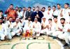 Winner team and dignitaries posing for group photograph at Bhadarwah on Saturday. (Excelsior/Tilak Raj)