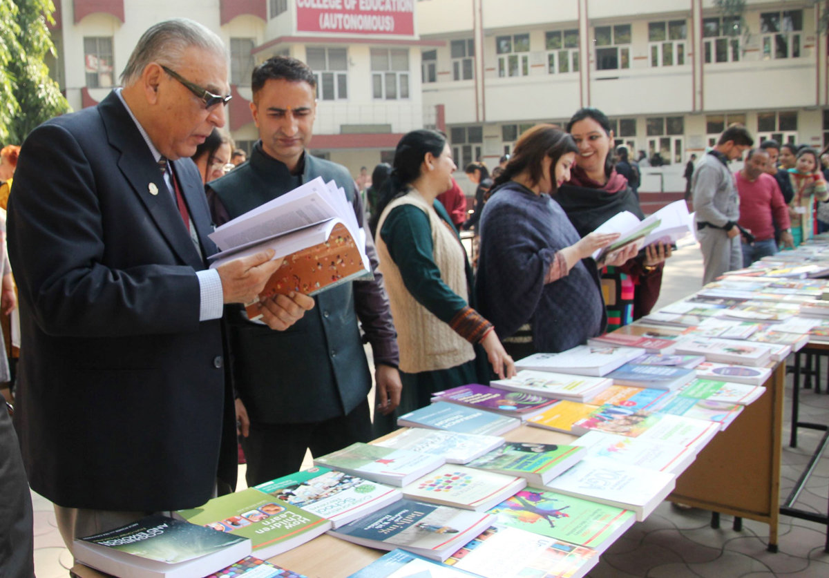 Dignitaries showing keen interest during book exhibition at MIER. Dignitaries showing keen interest during book exhibition at MIER.
