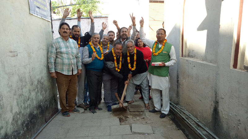 Corporator, Ward 36, Subash Sharma kick starting construction work of lane and drain on Tuesday. Corporator, Ward 36, Subash Sharma kick starting construction work of lane and drain on Tuesday.